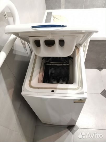 Стиральная машина с вертикальной загрузкой