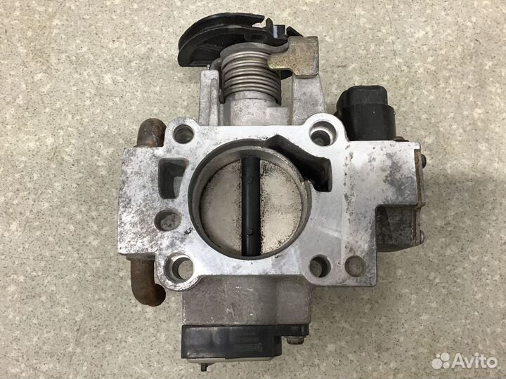 Заслонка дроссельная механическая Daewoo Nexia 199