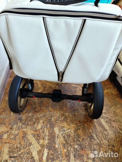 Коляска адамакс
