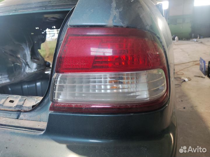 Задний правый фонарь nissan maxima a32