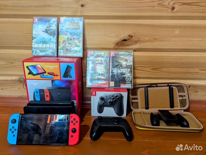 Nintendo Switch Oled 64Гб + геймпад + игры