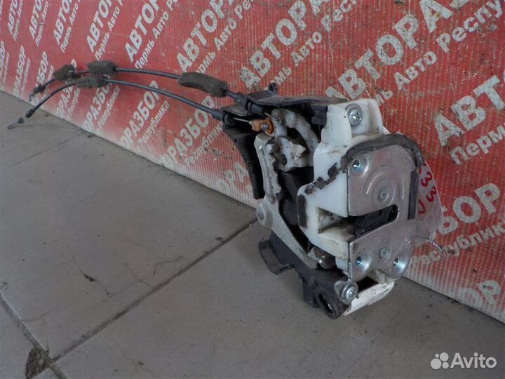 Замок двери передний правый Mitsubishi L200 KB