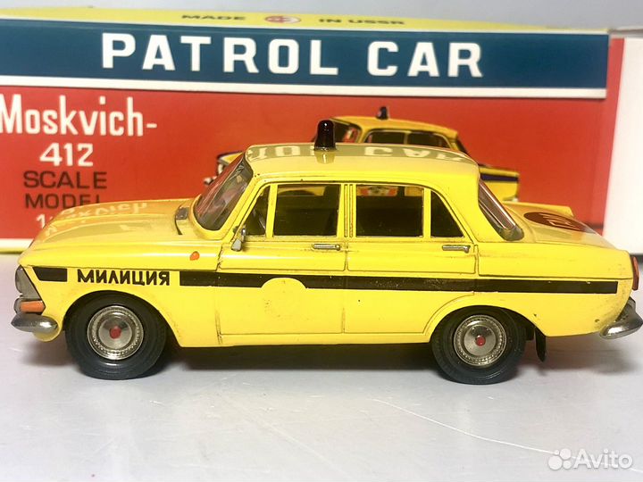 Модель автомобиля москвич 412 А8 патрульный СССР