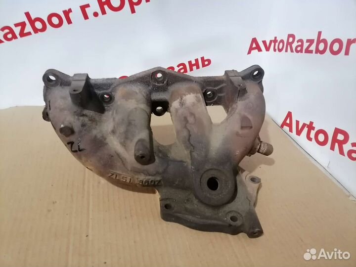 Колектор выпускной Mazda Familia ZL