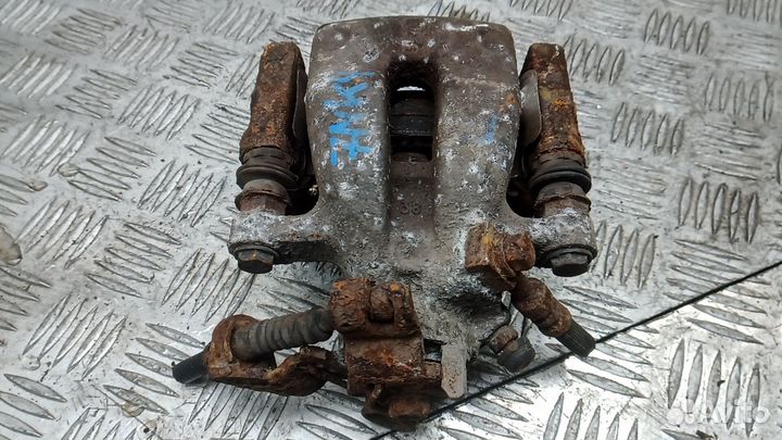 Суппорт тормозной задний левый opel astra H 2010