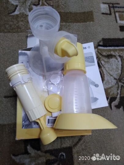 Ручной Молокоотсос