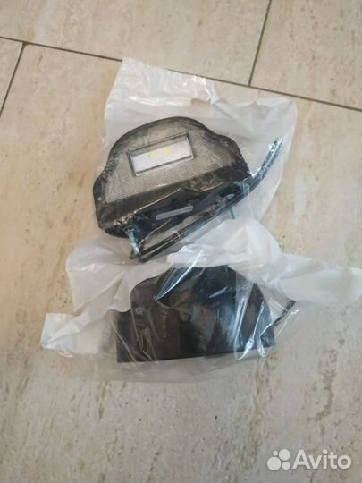 Фонарь подсветки номерного знака