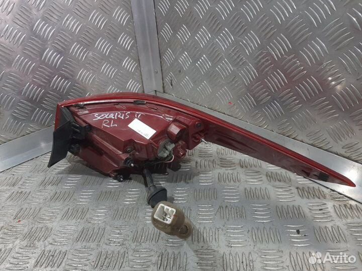 Фонарь наружный левый Hyundai Solaris HCR