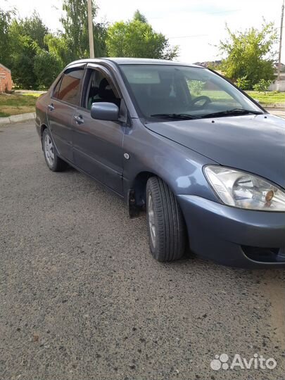 Mitsubishi Lancer 1.6 МТ, 2006, 241 000 км