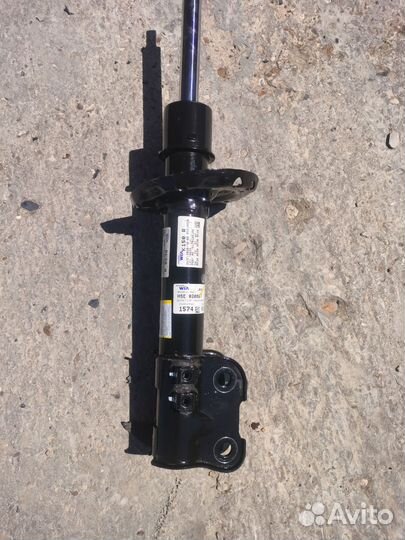 Стойка амортизатора KIA карнивалбу