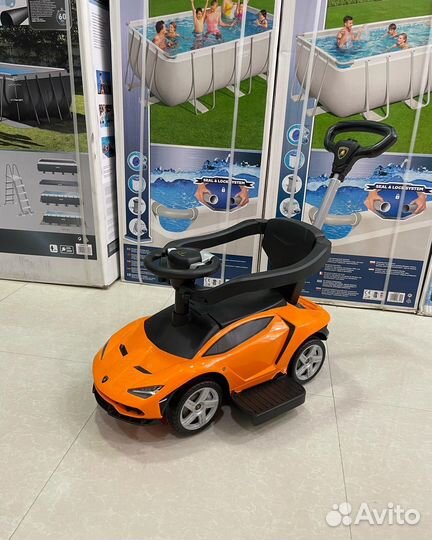 Машинка каталка толокар с ручкой