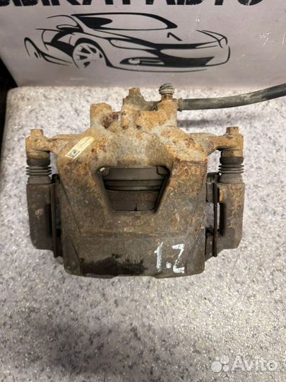 Суппорт передний левый Chevrolet Cruze J300