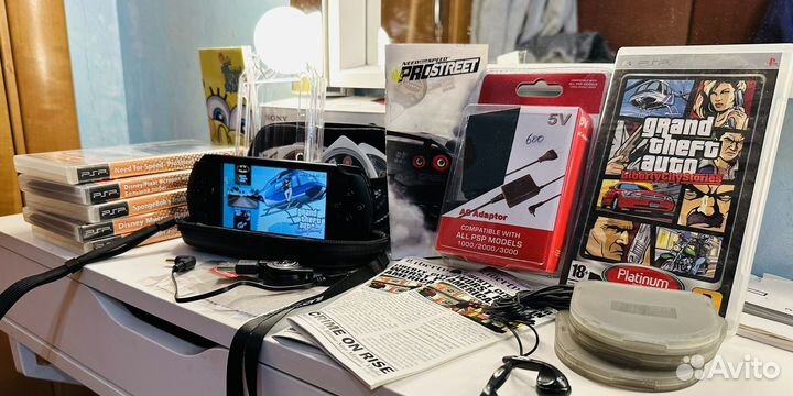 Sony PSP-E1008 Black 64 Gb(mega pack,3108 игр)