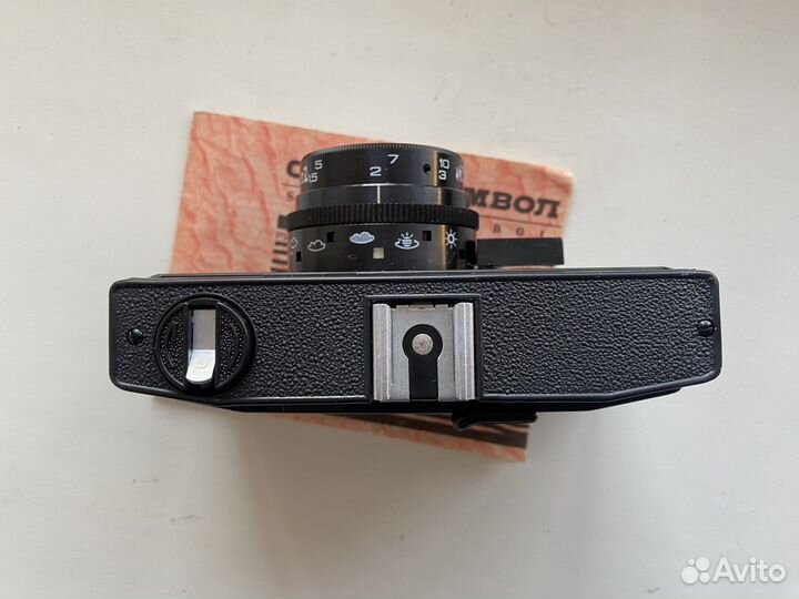 Плёночный фотоаппарат смена symbol