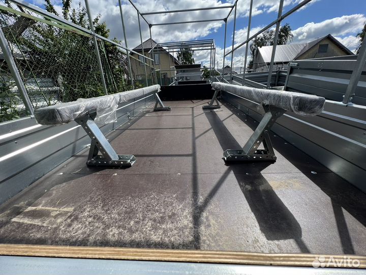 Приспособление для пвх лодки в бортовом прицепе