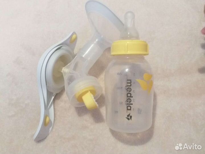 Молокоотсос medela ручной