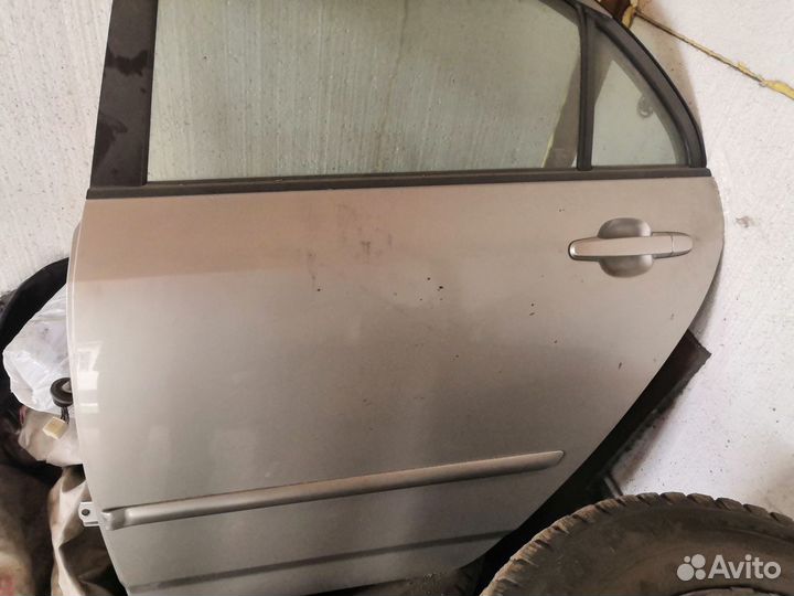 Дверь задняя левая Toyota Corolla