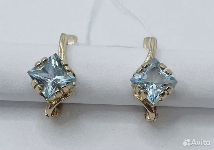 Золотые серьги с топазом