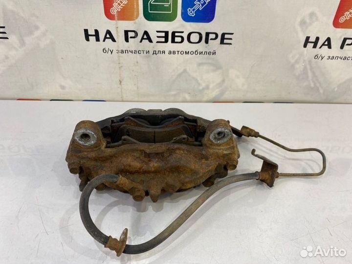 Суппорт передний левый Toyota Land Cruiser 200