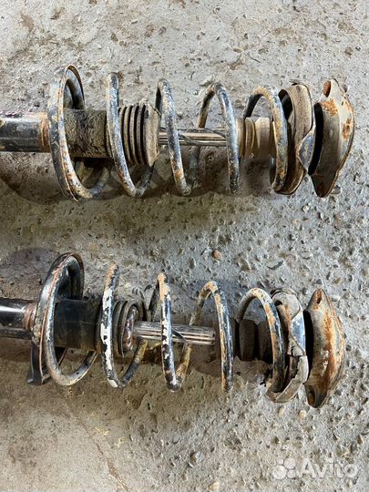 Стойка амортизатора задняя Mazda 626 GE