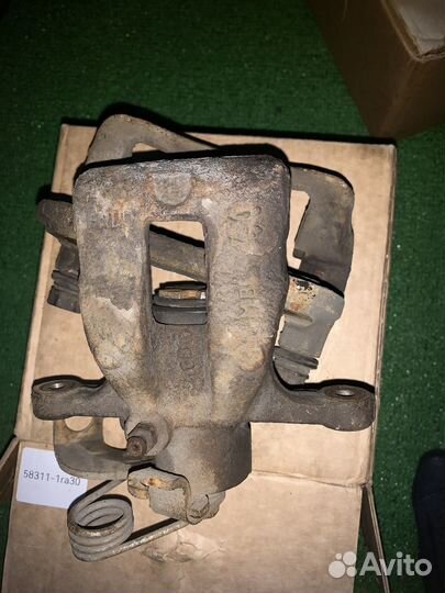 Суппорт тормозной задний kia rio 3