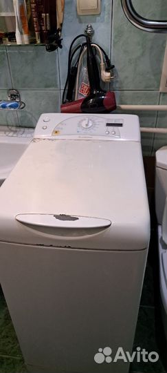 Стиральная машина с вертикальной загрузкой