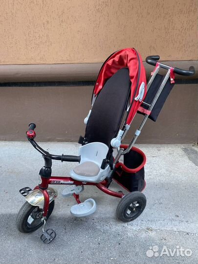 Детский трехколесный велосипед с ручкой