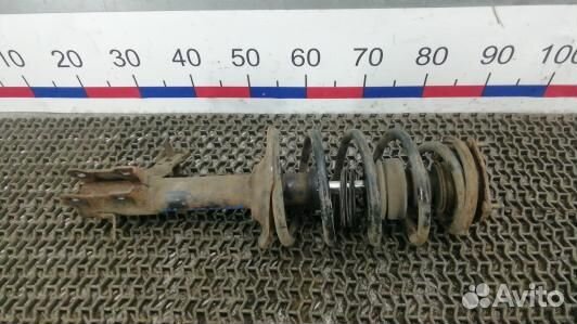 Стойка передняя левая nissan almera N16 (BEA35K501