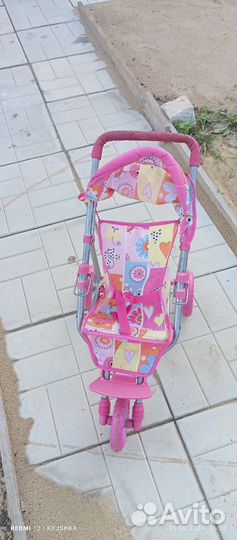 Игрушечная коляска для кукол