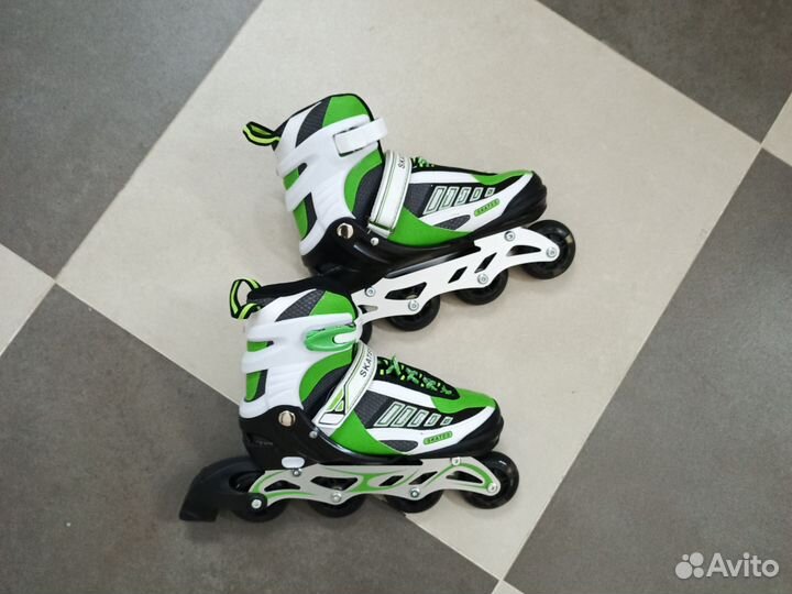 Роликовые коньки