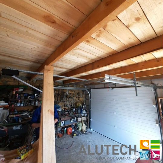 Секционные ворота для гаража alutech