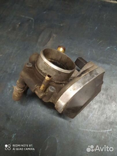 Дросельная заслонка 