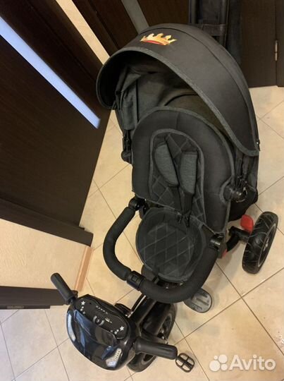 Трехколесный велосипед с ручкой