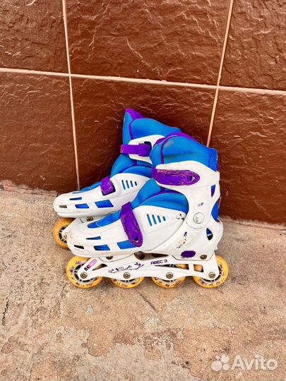 Роликовые коньки