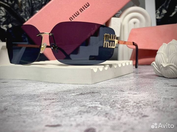 Очки Miu Miu женские