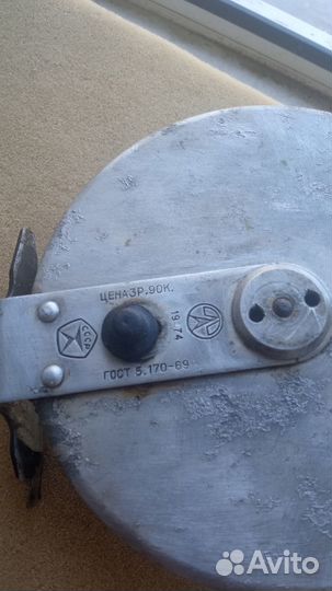 Катушка рыболовная инерционная