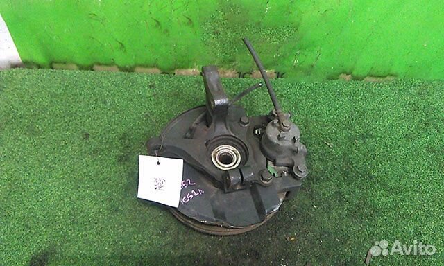 Кулак поворотный левый Mitsubishi Lancer 9