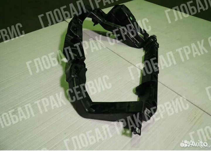 84234669 Кронштейн фары правый volvo