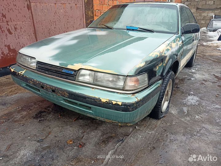Фара передняя левая Мазда 626 GD 8BGK51040