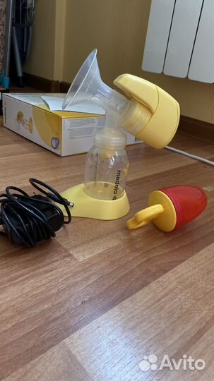 Молокоотсос электрический