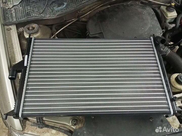 Радиатор Рено Логан Ларгус