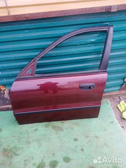 Дверь передняя левая Zaz Chance 2010