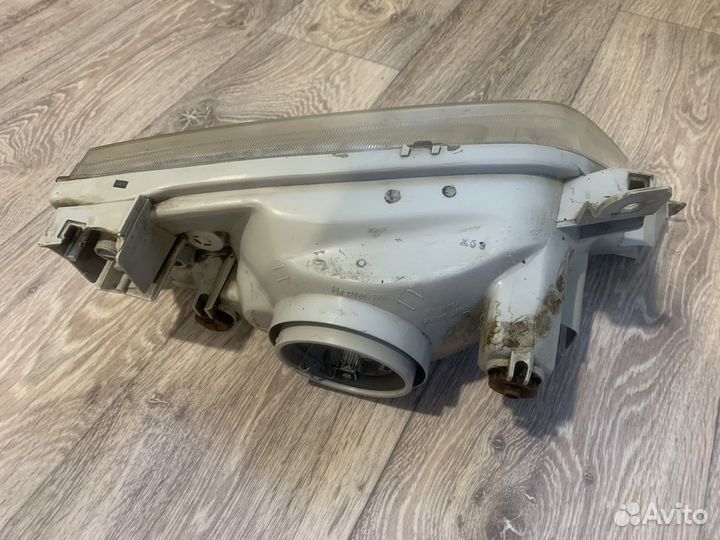 Фара левая toyota carina 210