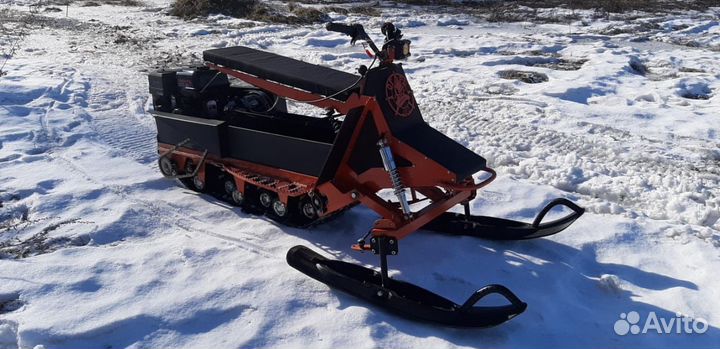 Мотобуксировщик с колесно лыжным модулем