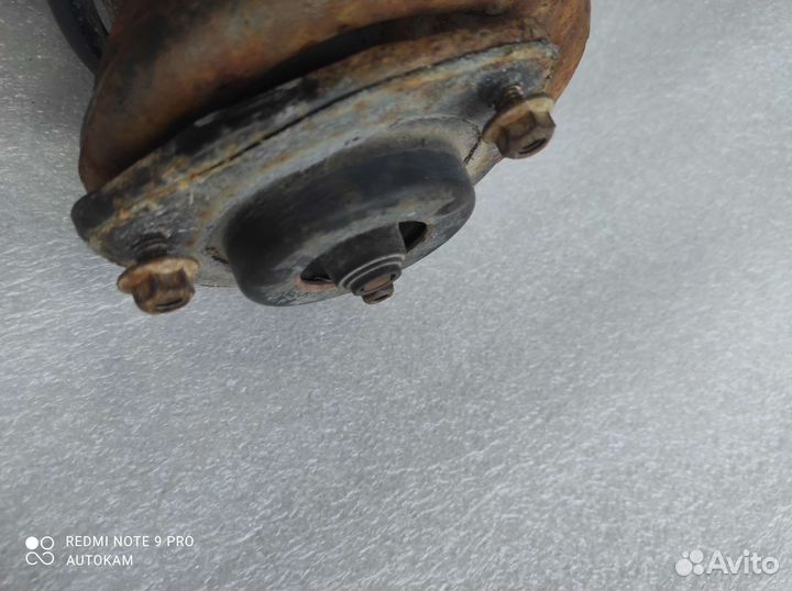 Стойка передняя левая Nissan Almera N15