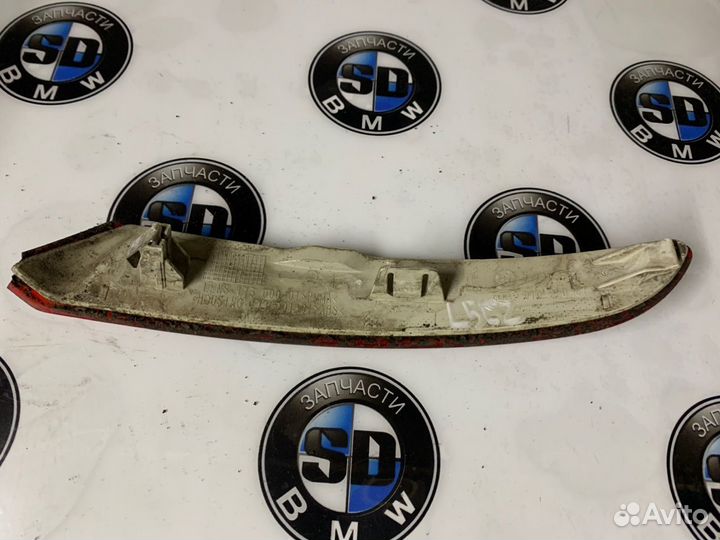 Отражатель бампера левый BMW F07