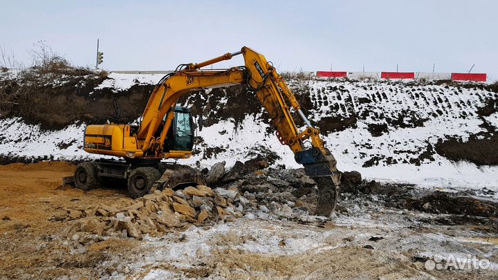 Экскаватор колёсный полноповоротный