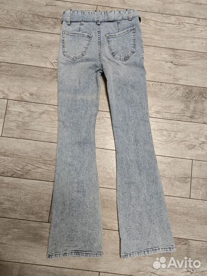 Джинсы клеш