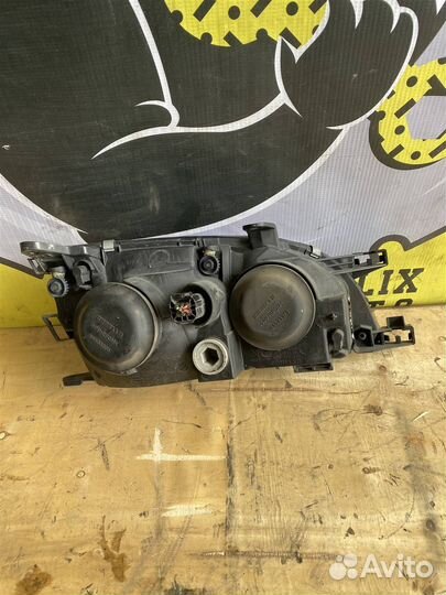 Фара левая Toyota Caldina (st215) 1997-2003