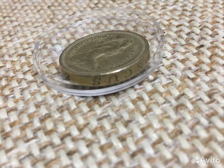 Великобритания 1 фунт 1983 года перевертыш